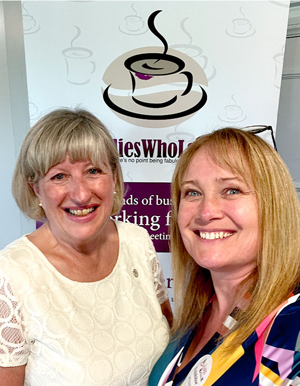 This is a photo of Julie Morris and Billie Sharp at the Ladies Who Latte stand at the Thames Valley British Expo, Windsor Racecourse